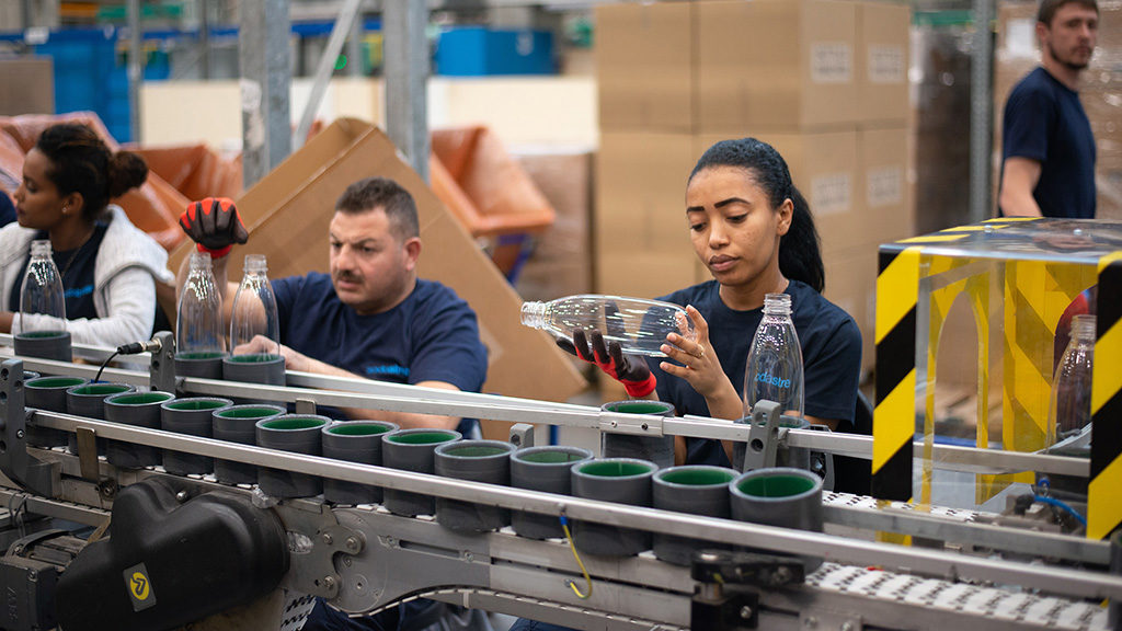 Workers on a factory line